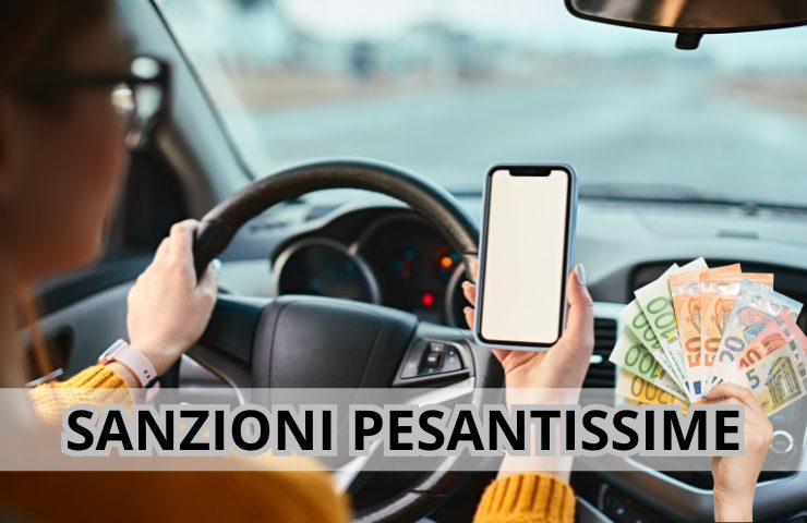 Donna alla guida con cellulare